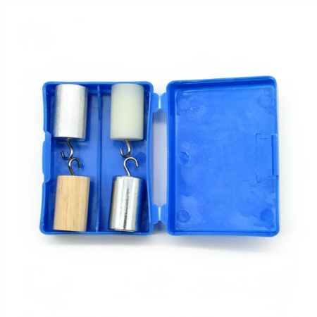 Набор тел равного объема (сталь, алюминий, пластик и дерево) цилиндры